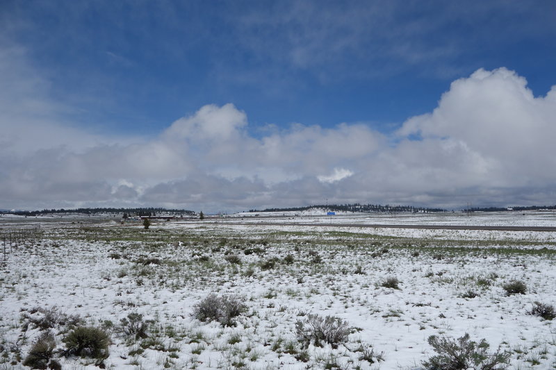 Winter and spring coexist near the 7.777 ft pass on Utah highway 12