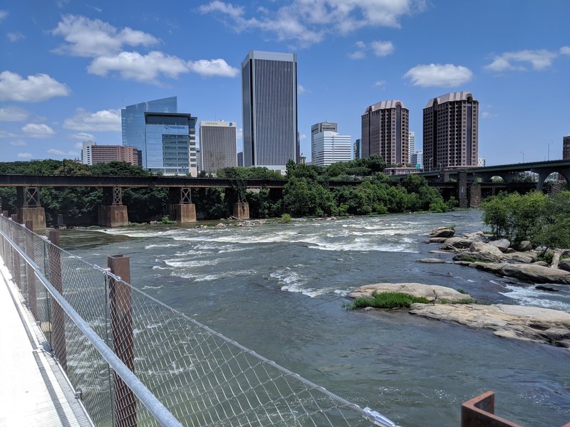 James River rapids and skyline from trail bridge.