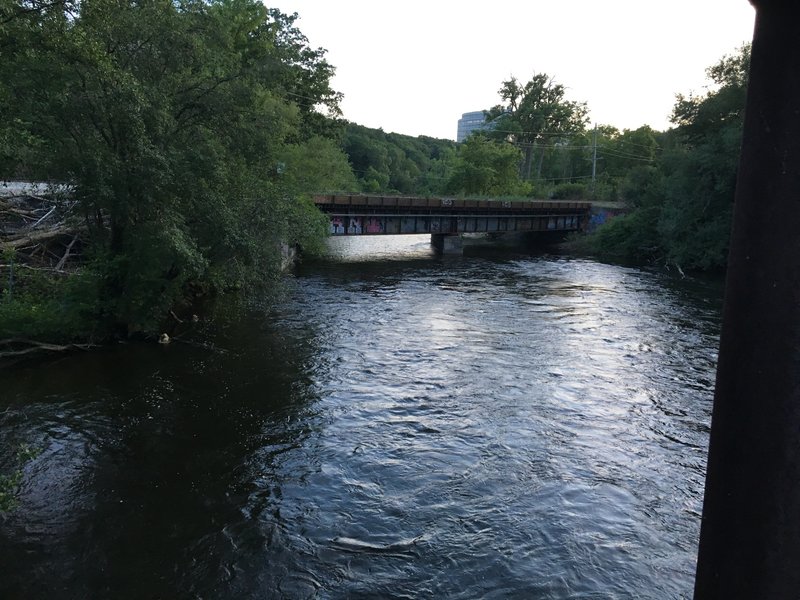 Bridge over Huron River facing southwest towards train bridge.