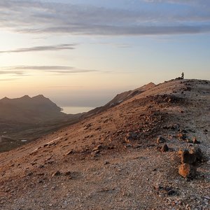 Standing on top of Gagnheiði looking at the midnight sun.