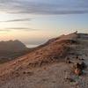 Standing on top of Gagnheiði looking at the midnight sun.