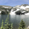 Waterfalls and snow in mid-July, as clear as an azure sky of deepest summer.