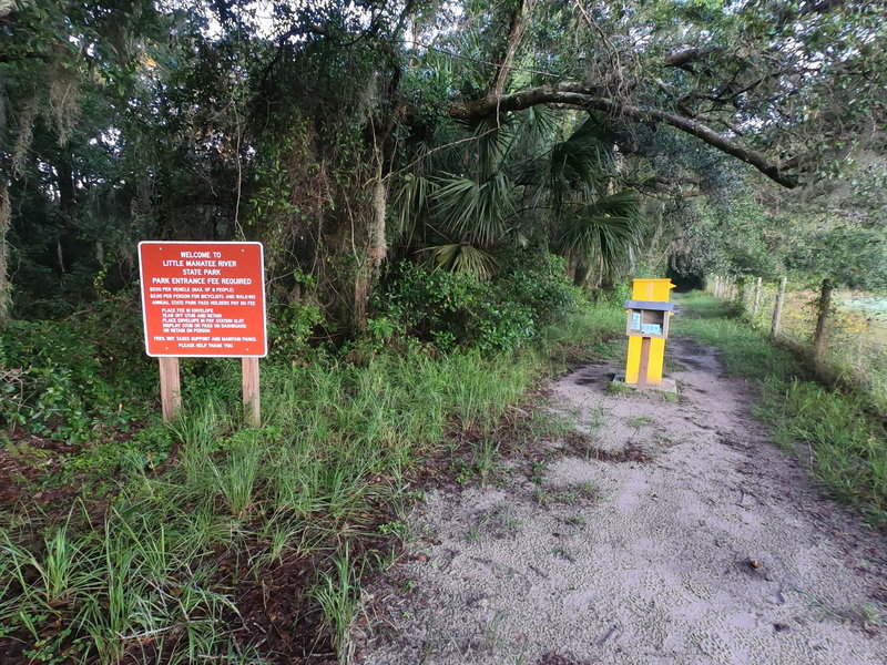 Sign at entrance and fee payment box.