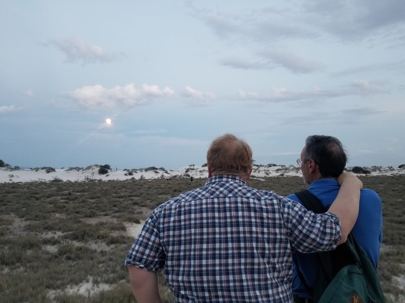 Watching the moon rise on the White Sands National Monument's "Full Moon Hike," held each month during the full moon.