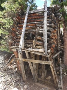 Abandoned and collapsed mine heading up the Mayflower Gulch Trail.