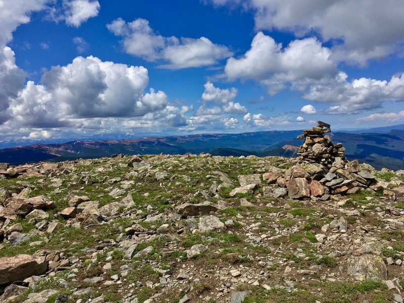 View from the summit with Summit Cairn marker - looking South/Southwest.