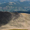 Tiny hut on a ridge below the summit