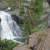 Cascade on River Trail near a large campsite.