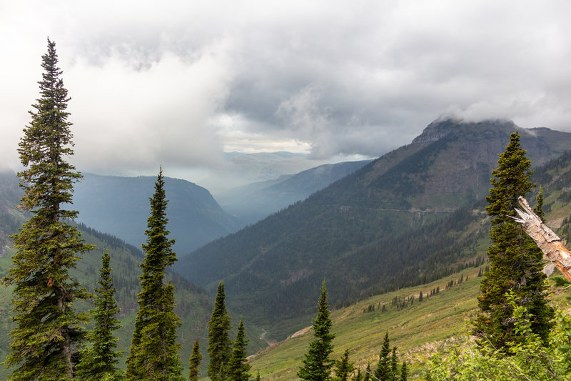 The top of Haystack Butte covered in clouds.