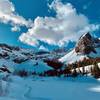 Frozen Lake Blanche and snow-capped Sundial Peak.