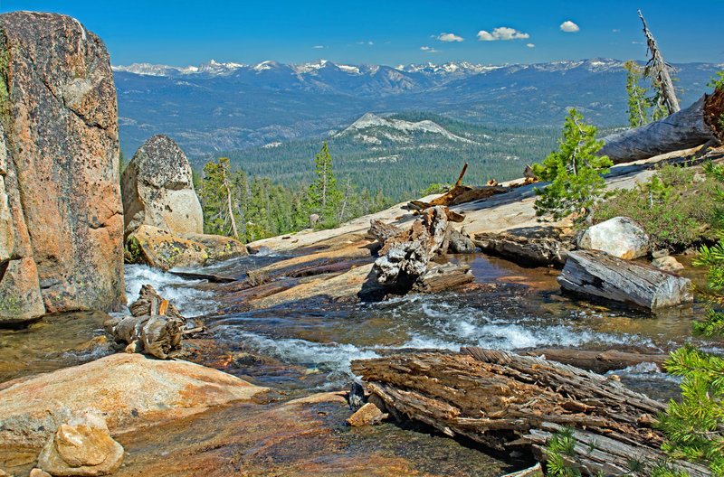 Outlet from Lower Jackass Lakes drops quickly. Balloon Dome is in the center. The ridge on the left is the Silver Divide. The one on the right is the Kaiser Wilderness. In between is the South Fork of the San Joaquin River.