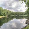 Beautiful calm lake at the very beginning of the hike.