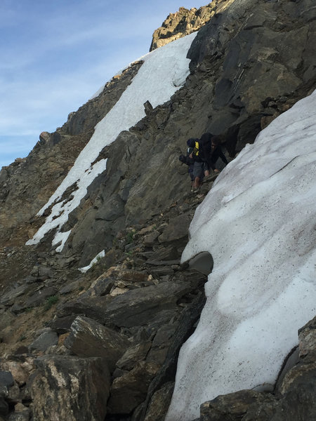 Path as marked from Caribou Pass to Arapahoe Pass is very exposed, narrow, and only suitable for experienced, sure-footed hikers. We turned back rather than risk crossing along steep snowpack,