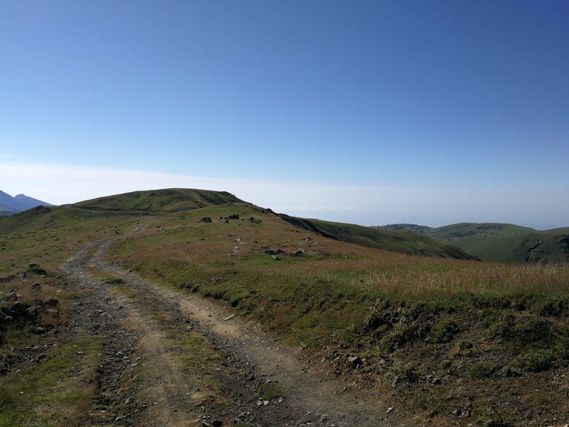 Looking back down the trail.  Gomismta village is just visible on the right.