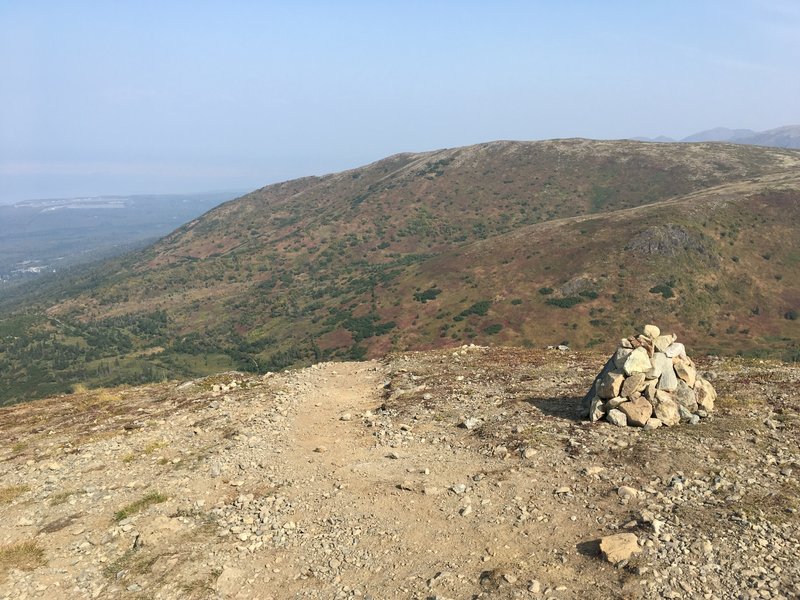 Descending from the top, stay to the right and watch for the rock pile. This is the start of the easy way down.