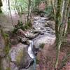 Shallow pools and sluices upstream of the bridge