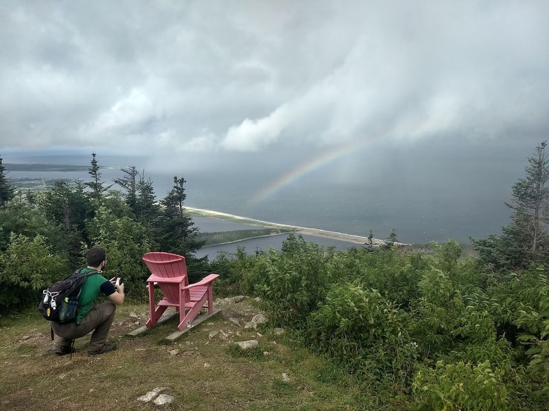 Another big red chair, looking toward Cheticamp and Petit Etang