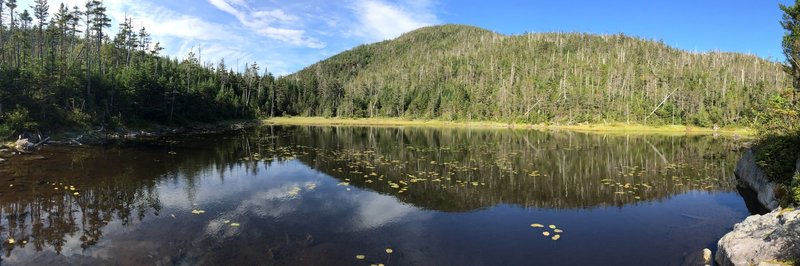 Lake Arnold with wooded false summit of Colden