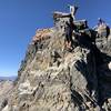 The 20 foot Class 4 scramble at the end of Chicken-Out Ridge (the rope may not always be there).