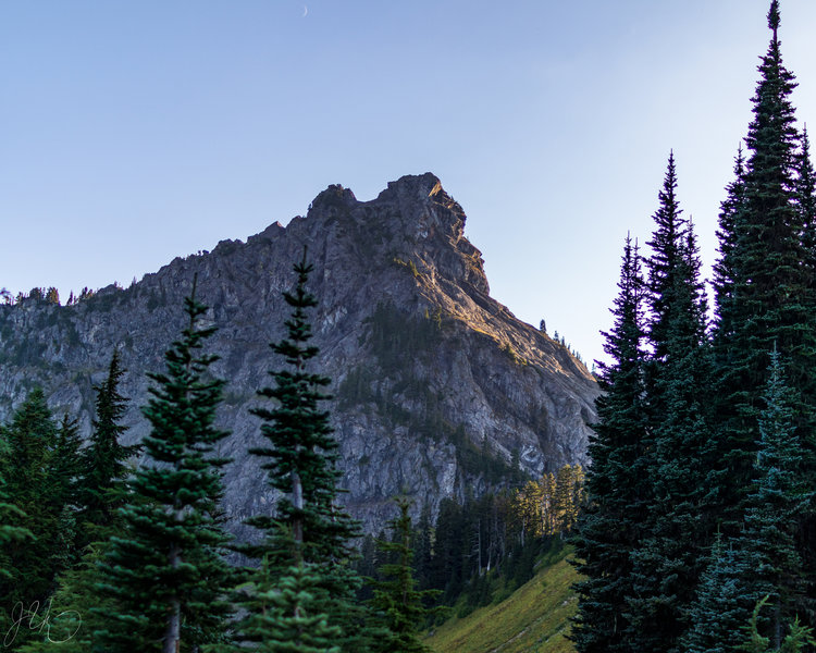 The peak you see once you start to descend to the lake.