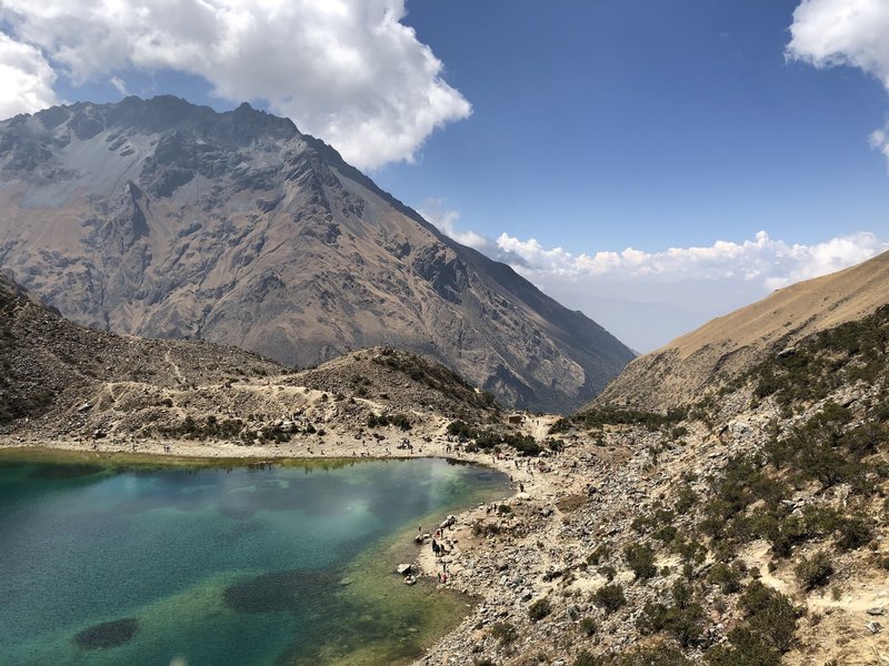 Rear view from Humantay Lake. The Soraypampa Trek to Humantay Lake ends in the right corner, where hikers are stopped for photos.
