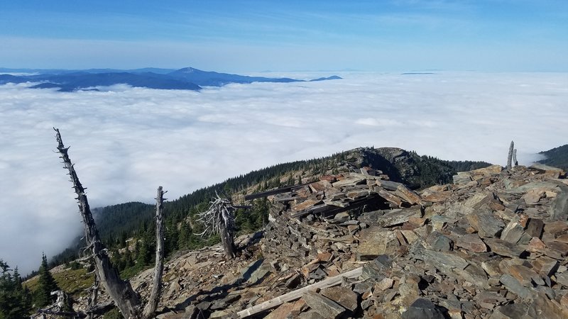 Summit of Scotchman Peak looking back along trail - morning fog below.