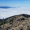 Summit of Scotchman Peak looking back along trail - morning fog below.