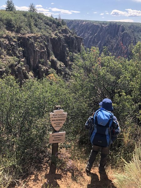 Trailhead is marked with this sign reminding you a wilderness permit is needed.