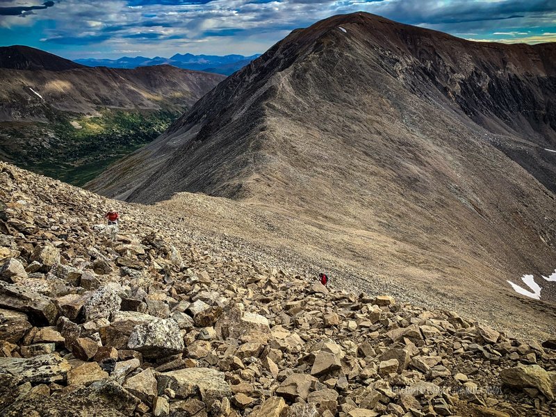 2ND Breakfast, fellow travelers on their way up. Top of the false summit. Mount Cameron east view. 13,820'. O9:00 am September 4, 2019