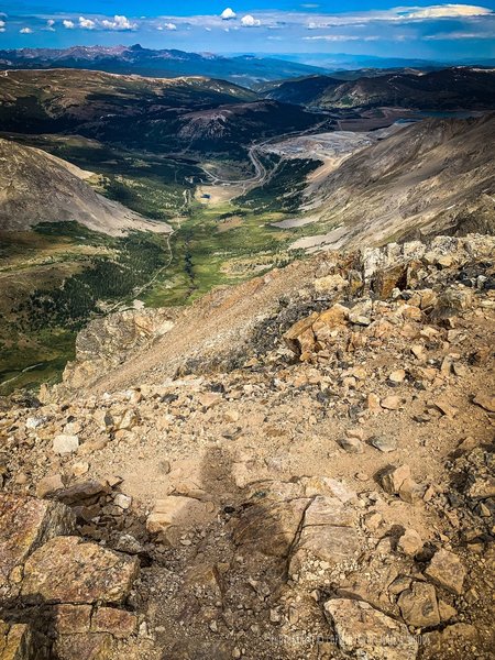 View from the Summit of Mount Democrat, 14,148' looking southeast towards the Kite Lake Trailhead, 2200' feet down. That 5.5 mile rutted dirt road from Alma, Colorado gets you here. 2WD not recommended but possible.