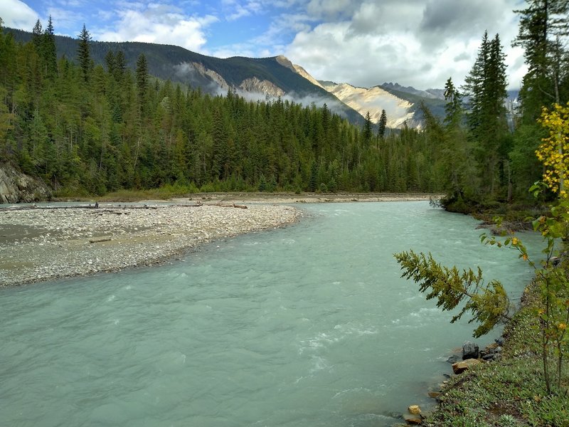 The beautiful, turquoise Blaeberry River in the mountains. Thompson Falls Trail runs next to it here.