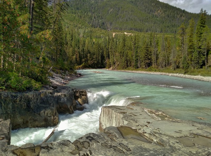 The Blaeberry River plunges over the top cascade of Thompson Falls.