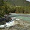 The Blaeberry River plunges over the top cascade of Thompson Falls.