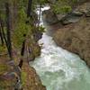 The top falls of Lower Sunwapta Falls plunges into a gorge leading to the next major drop.