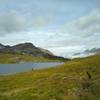 At Maligne Pass, a small lake is passed by Maligne Pass Trail.