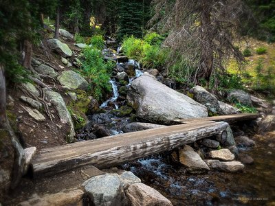 The footbridge across Alpine Brook, just below tree line and an awesome rest spot to listen as water cascades down. On the way up in darkness this is a great marker of progress along the trail, well defined and maintained.