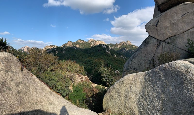 View of ridge traverse route from BiBong. You'll be working your way across the valley to the right side peak, then traversing left to the high peak in the far left frame.