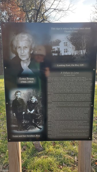 Sign explaining history of Brum Woods.