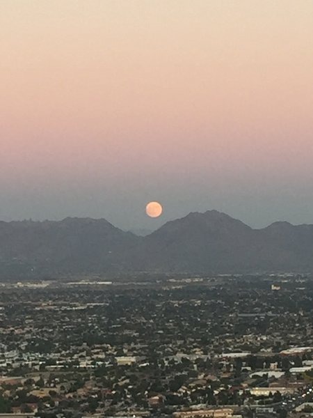 Moon coming up after watching the sunset in the other direction.