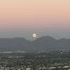 Moon coming up after watching the sunset in the other direction.