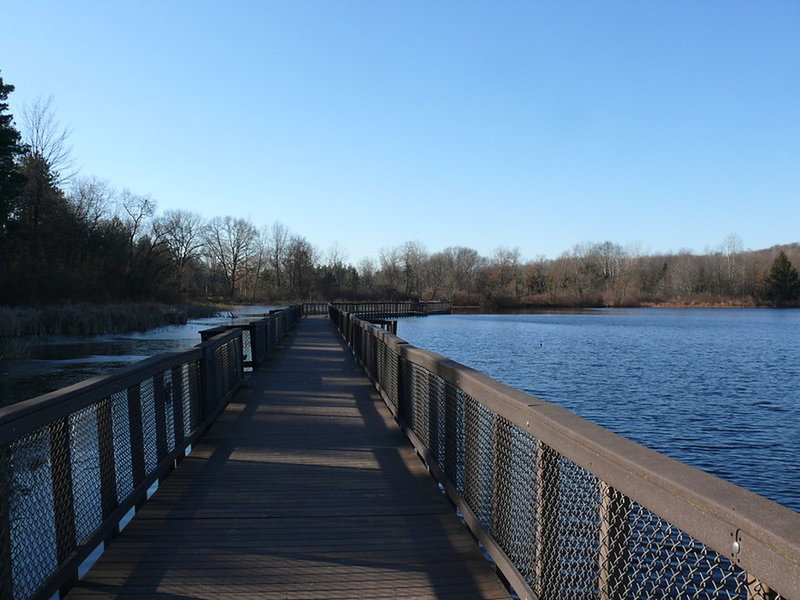Pickerel Lake Walkway" by John Winkelman (https://tinyurl.com/v95vdys), Flickr licensed under CC BY 2.0 (https://creativecommons.org/licenses/by/2.0/)
