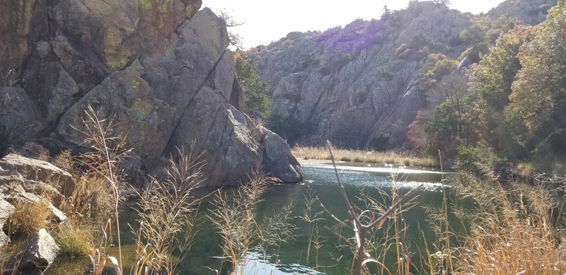 Beautiful clear water at the beginning. As you start you'll come to a fork. If you go left that will get you to the top of the rock face on the left of this photo. Go right and you be where I took this.