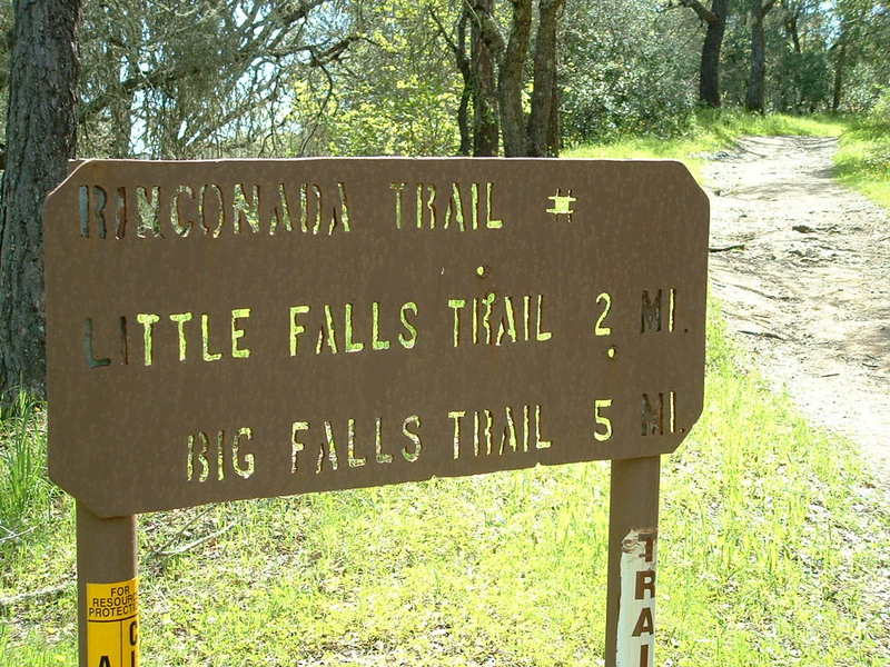 Trailhead, left side of the parking area