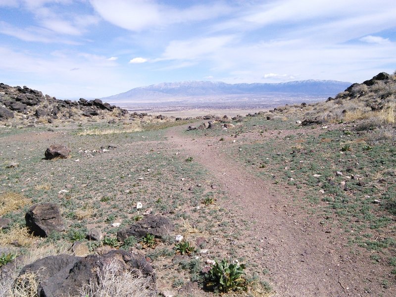 Saddle on the north side of Vulcan provides expansive views of Albuquerque and the Sandias