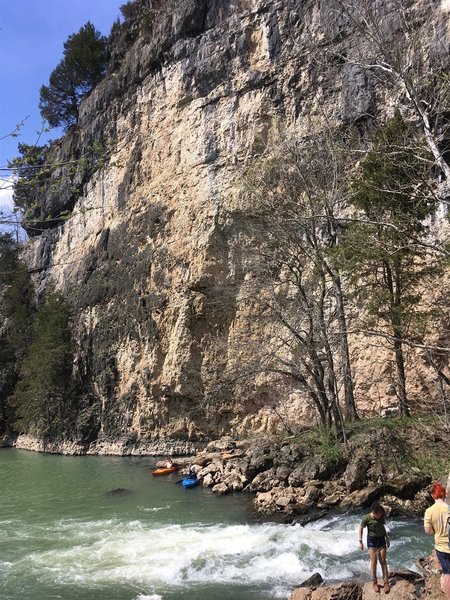 The massive bluff facing the trail. The castle remains are at the top of this bluff. Watch for rockfall if kayaking below, as pictured.