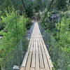 Suspension bridge crossing the Popo Agie at the trailhead