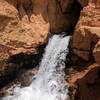 A closeup of Cascade Falls coming out of the cliff