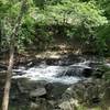 You'll see a small waterfall along the greenway as you hike.