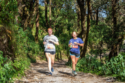 Runners on the unpaved section of the trail.