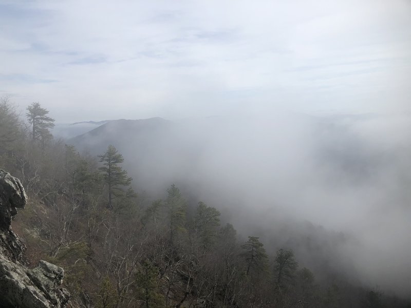 Fog clearing from the valley below.